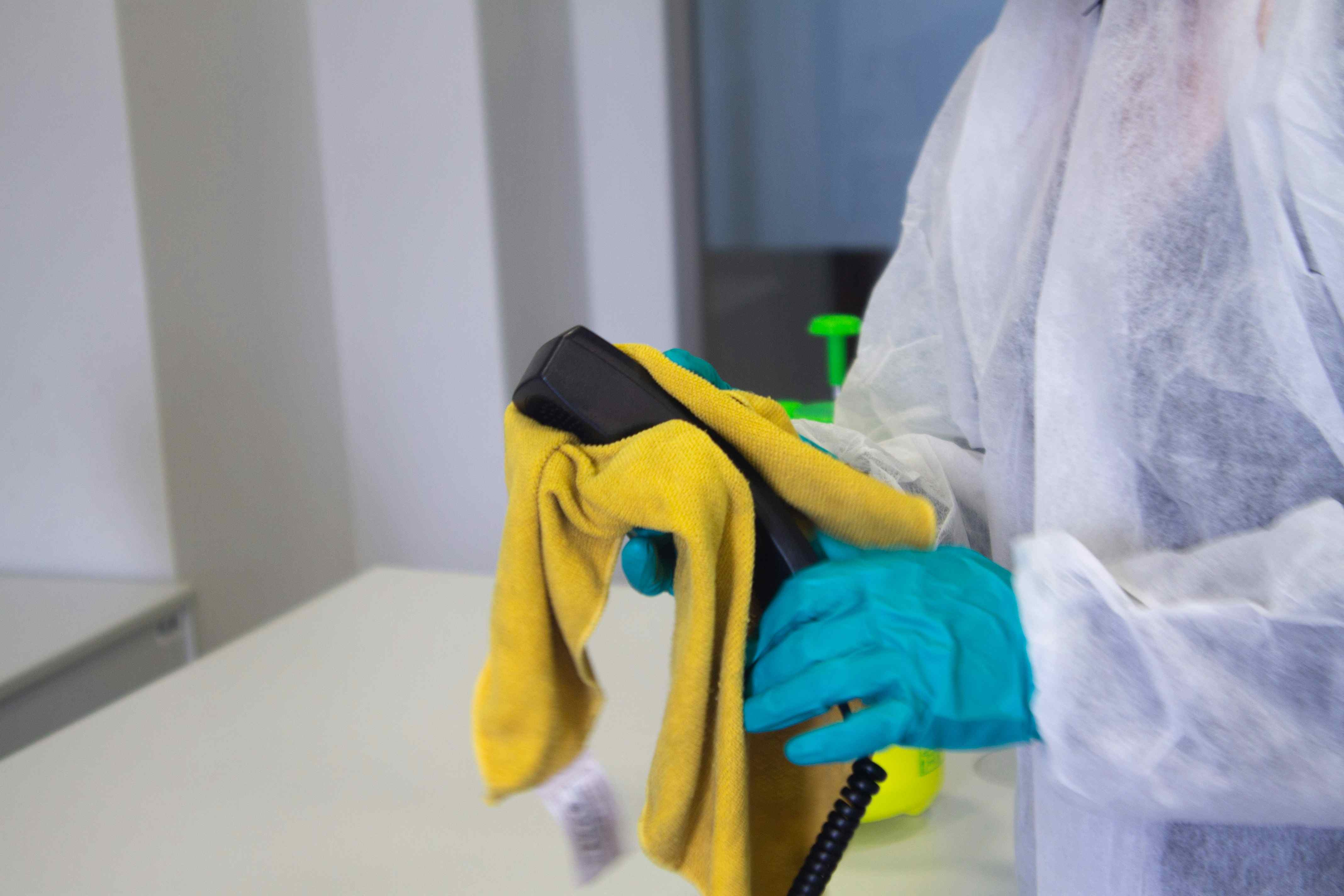 Commercial cleaning — sanitizing office equipment